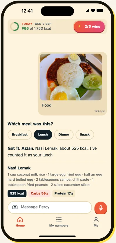 A photo of nasi lemak in Percy's chat, logged as lunch at about 525 kcal with carbs and protein.